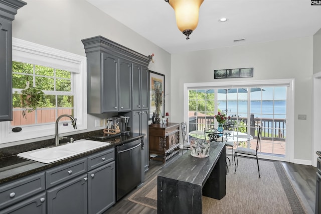 1305 Rock Island Rd, Gilbert, SC 29054 - kitchen featuring visible vents, gray cabinets, stainless steel dishwasher, a sink, and dark wood-style flooring
