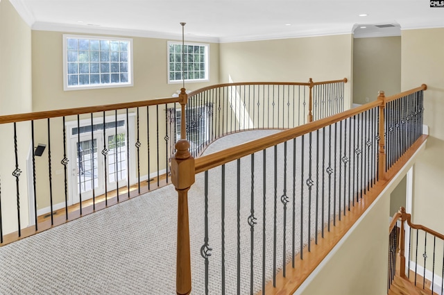 stairway featuring baseboards, ornamental molding, visible vents, and recessed lighting