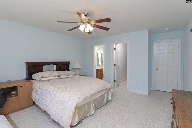 bedroom featuring a ceiling fan, baseboards, and light colored carpet