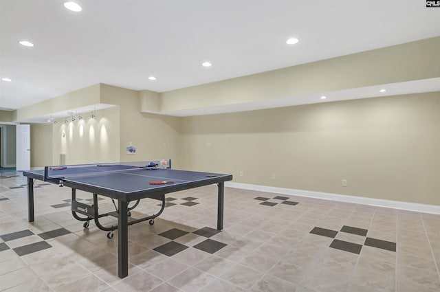 recreation room with baseboards and recessed lighting