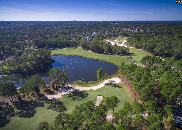 bird's eye view with a water view, a wooded view, and golf course view