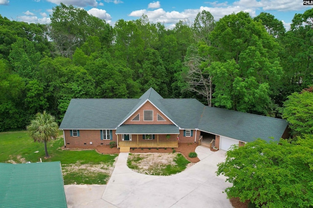 2310 Priceville Rd, Gilbert, SC 29054 - view of front facade featuring driveway, a porch, an attached garage, crawl space, and a front yard