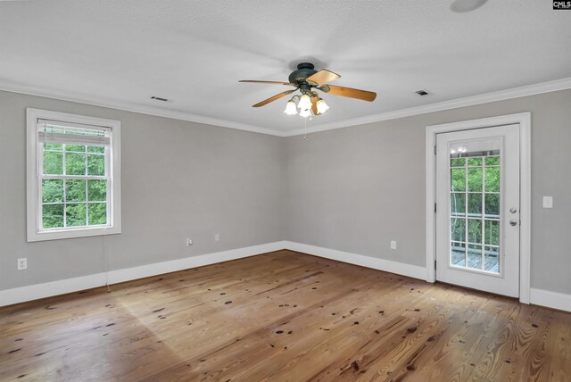 2310 Priceville Rd, Gilbert, SC 29054 - empty room featuring wood finished floors, plenty of natural light, a ceiling fan, and baseboards