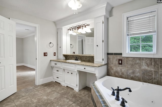 2310 Priceville Rd, Gilbert, SC 29054 - bathroom with ornamental molding, baseboards, a tub with jets, and vanity