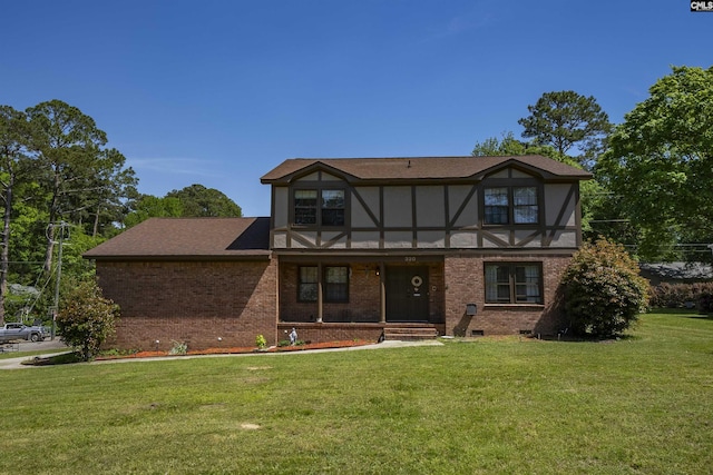320 Brookshire Dr, Columbia, SC 29210 - tudor home with crawl space, covered porch, a front lawn, and brick siding