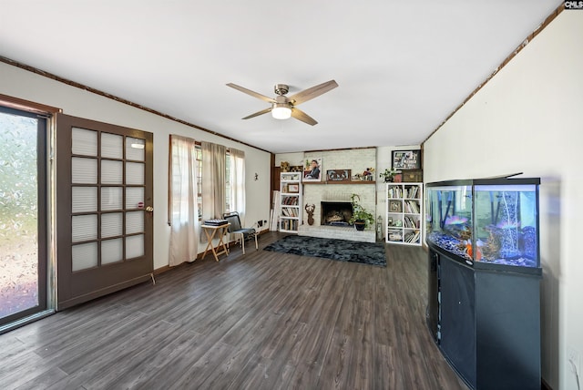 320 Brookshire Dr, Columbia, SC 29210 - living area featuring wood finished floors, a brick fireplace, and a ceiling fan