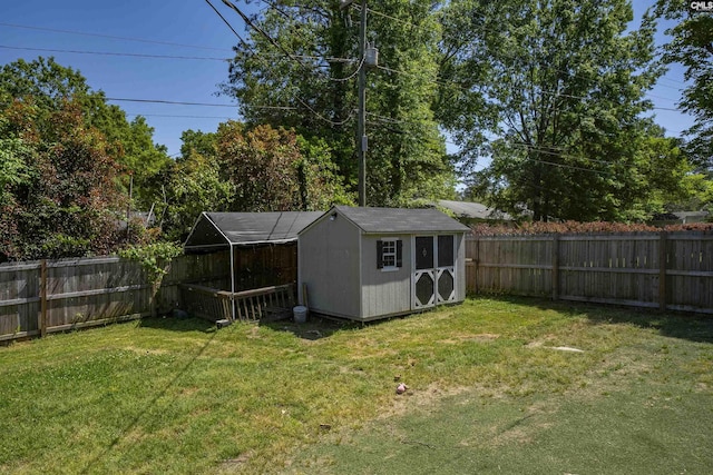 320 Brookshire Dr, Columbia, SC 29210 - view of yard with a fenced backyard, an outdoor structure, and a storage unit