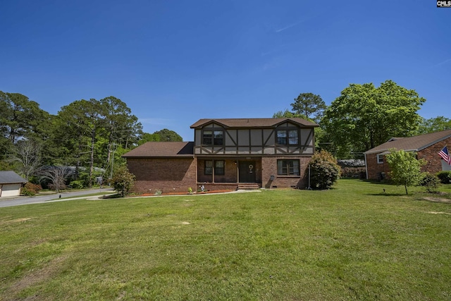 320 Brookshire Dr, Columbia, SC 29210 - tudor-style house with brick siding and a front yard