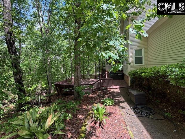 view of yard with a deck