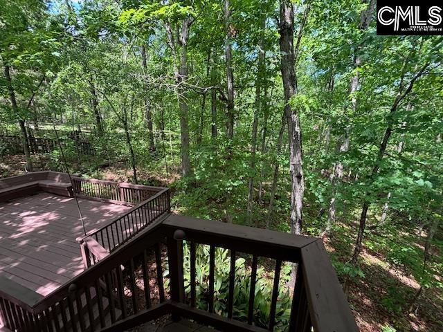wooden deck featuring stairway