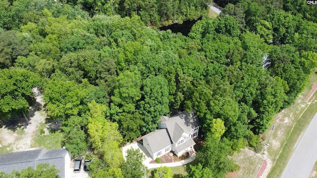 aerial view with a wooded view