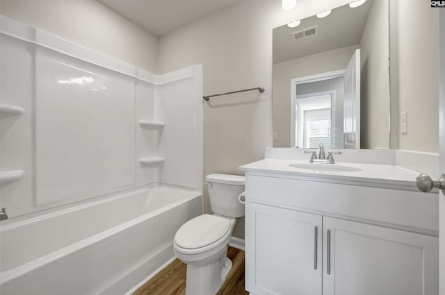 227 Carillo Dr, Columbia, SC 29223 - full bath featuring  shower combination, toilet, visible vents, wood finished floors, and vanity