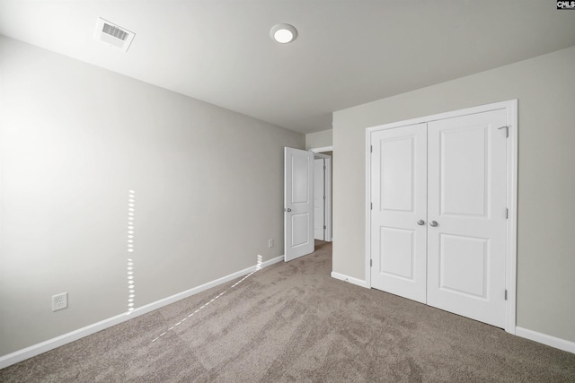 227 Carillo Dr, Columbia, SC 29223 - unfurnished bedroom featuring baseboards, visible vents, carpet, and a closet