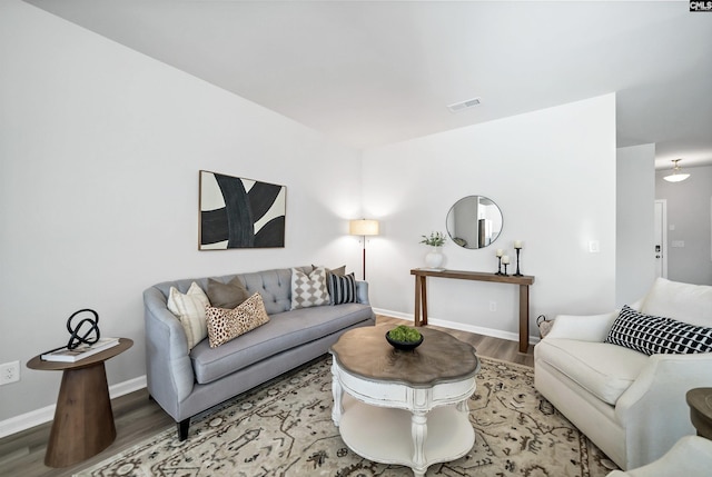 227 Carillo Dr, Columbia, SC 29223 - living area featuring wood finished floors, visible vents, and baseboards