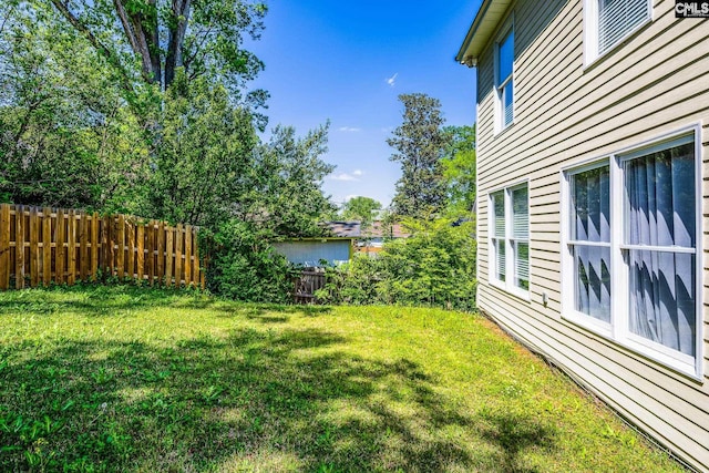 view of yard with fence
