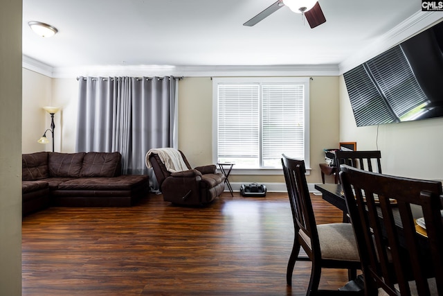 dining room featuring ceiling fan, wood finished floors, and ornamental molding