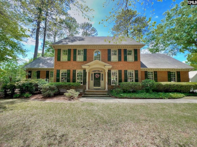 110 Columbia Club Dr, Blythewood, SC 29016 - colonial house featuring brick siding and a front yard