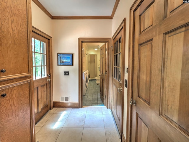 110 Columbia Club Dr, Blythewood, SC 29016 - doorway featuring ornamental molding, light tile patterned floors, baseboards, and independent washer and dryer