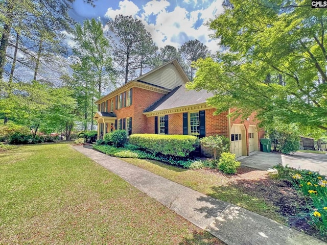 110 Columbia Club Dr, Blythewood, SC 29016 - view of front of home with brick siding, concrete driveway, a front lawn, and an attached garage
