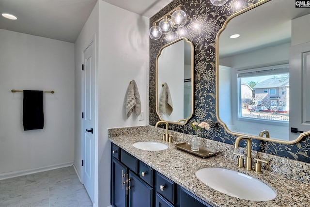 207 Ashewicke Dr, Columbia, SC 29229 - full bathroom featuring baseboards, a sink, marble finish floor, and double vanity