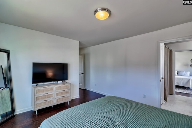 207 Ashewicke Dr, Columbia, SC 29229 - bedroom featuring baseboards and wood finished floors