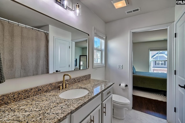 207 Ashewicke Dr, Columbia, SC 29229 - bathroom with vanity, a wealth of natural light, toilet, visible vents, and ensuite bath