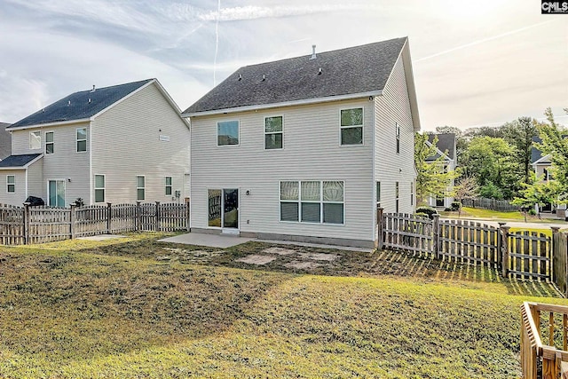 207 Ashewicke Dr, Columbia, SC 29229 - rear view of house featuring a fenced backyard, a patio, and a lawn