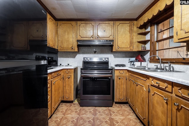 1742 Orrs Station Rd, Chester, SC 29706 - kitchen featuring ventilation hood, light countertops, a sink, brown cabinetry, and stainless steel electric range oven