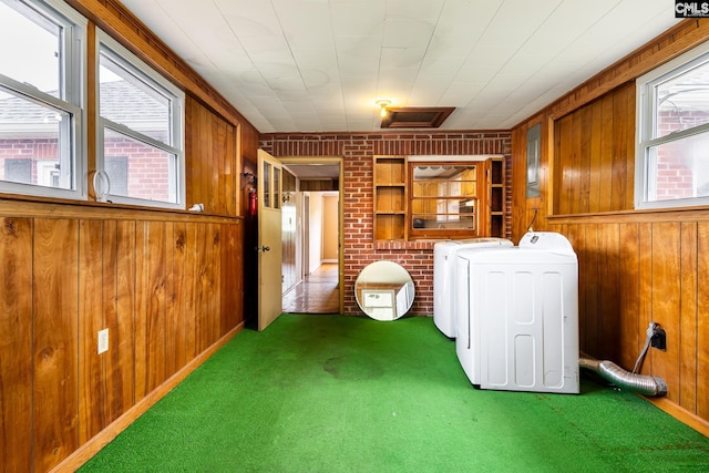 1742 Orrs Station Rd, Chester, SC 29706 - laundry area featuring separate washer and dryer, wooden walls, and plenty of natural light