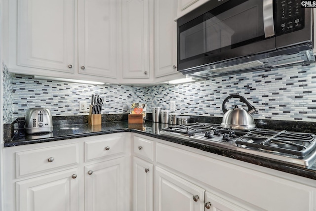 6 Sienna Ct, Chapin, SC 29036 - kitchen with white cabinets, tasteful backsplash, stainless steel gas stovetop, and dark stone countertops