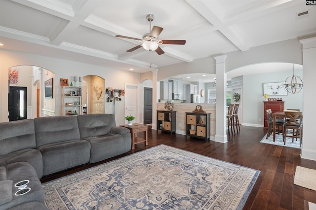 living room featuring visible vents, coffered ceiling, ceiling fan with notable chandelier, beamed ceiling, and dark wood-type flooring
