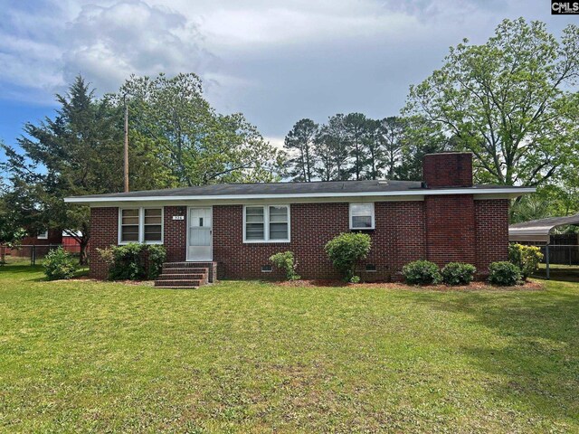 326 Nell St, Batesburg, SC 29006 - ranch-style house featuring crawl space, a chimney, a front lawn, entry steps, and a detached carport