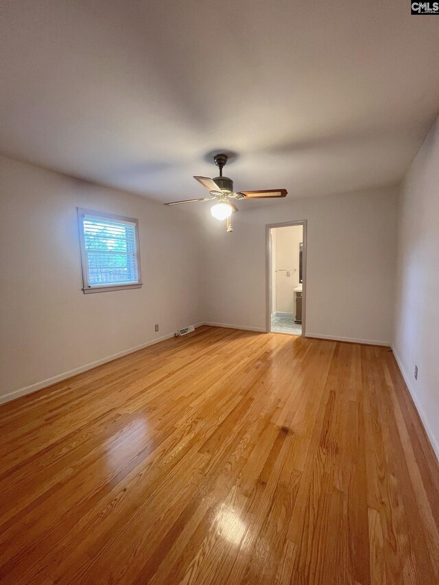326 Nell St, Batesburg, SC 29006 - unfurnished room with visible vents, a ceiling fan, baseboards, and light wood-style floors