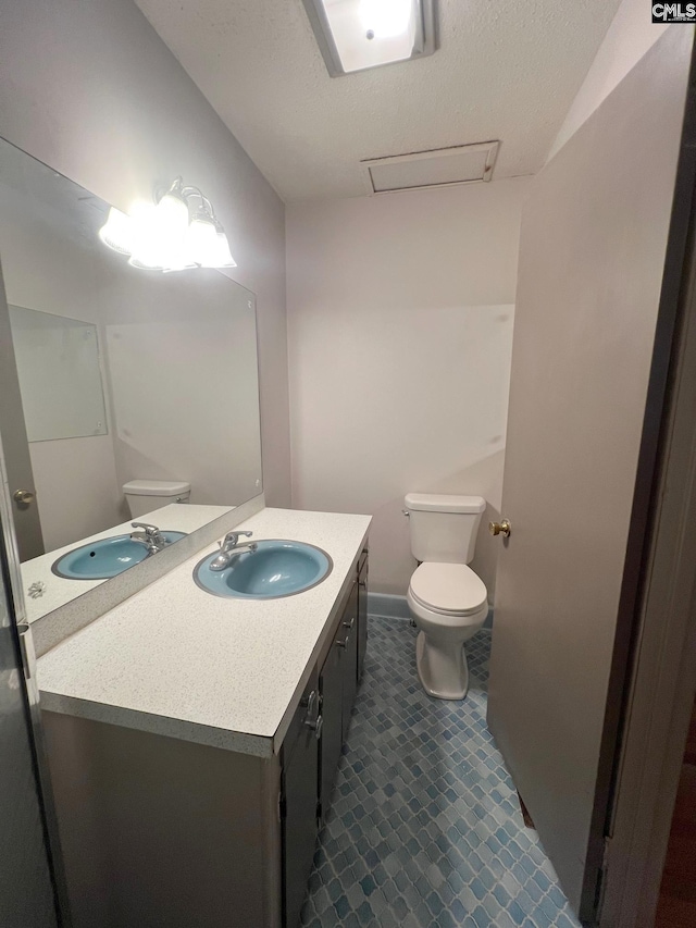 326 Nell St, Batesburg, SC 29006 - half bath featuring toilet, vanity, and tile patterned floors