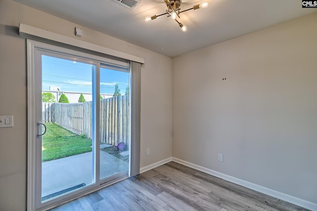 258 Gum Swamp Trl, West Columbia, SC 29169 - doorway to outside featuring baseboards, wood finished floors, and visible vents