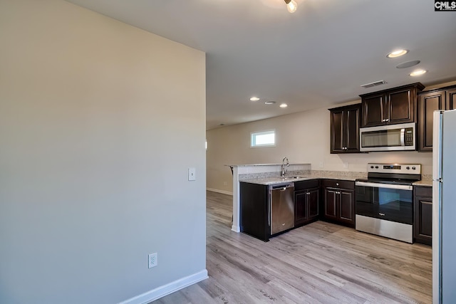 258 Gum Swamp Trl, West Columbia, SC 29169 - kitchen featuring a peninsula, baseboards, visible vents, recessed lighting, and appliances with stainless steel finishes