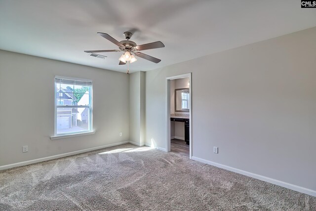 258 Gum Swamp Trl, West Columbia, SC 29169 - carpeted spare room with ceiling fan, baseboards, and visible vents