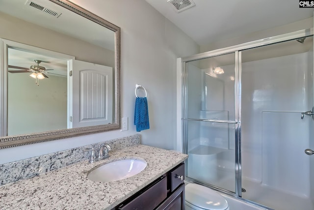 258 Gum Swamp Trl, West Columbia, SC 29169 - bathroom featuring visible vents, toilet, vanity, and a shower with door