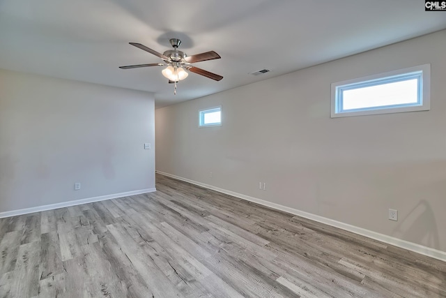 258 Gum Swamp Trl, West Columbia, SC 29169 - empty room with baseboards, wood finished floors, visible vents, and a ceiling fan
