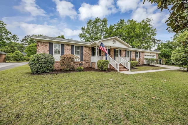 ranch-style home featuring brick siding, crawl space, a porch, and a front yard