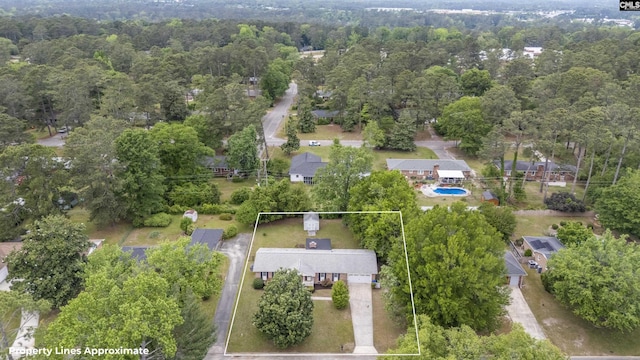 bird's eye view with a view of trees