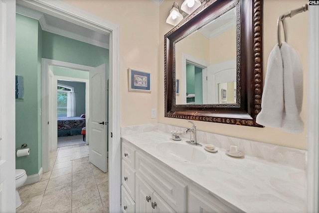 1437 Heins Rd, Blythewood, SC 29016 - bathroom featuring crown molding, ensuite bathroom, baseboards, toilet, and vanity