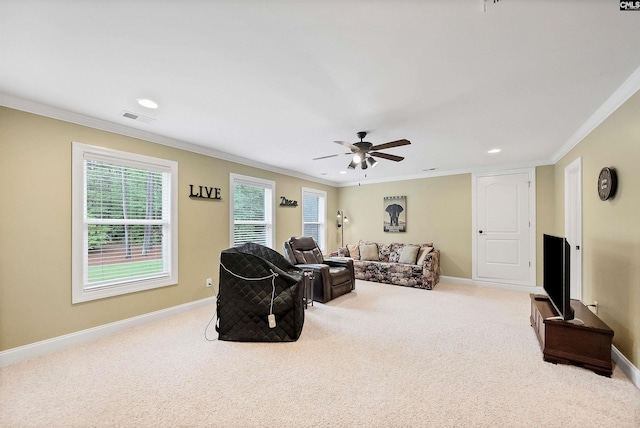 1437 Heins Rd, Blythewood, SC 29016 - living room with crown molding, a ceiling fan, visible vents, and carpet flooring