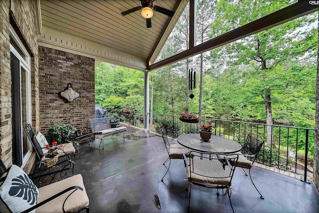 1437 Heins Rd, Blythewood, SC 29016 - view of patio / terrace with outdoor dining space, a ceiling fan, and a forest view