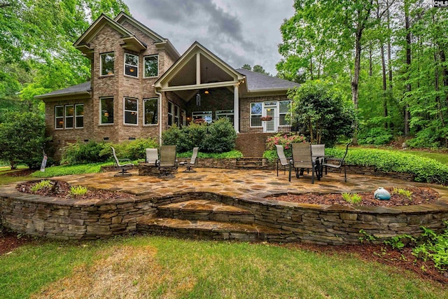 1437 Heins Rd, Blythewood, SC 29016 - rear view of house with brick siding, crawl space, and a patio