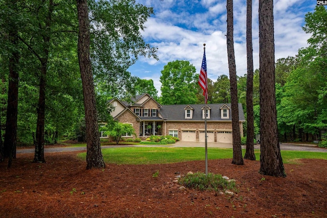 1437 Heins Rd, Blythewood, SC 29016 - view of front facade with a garage, brick siding, a front lawn, and concrete driveway
