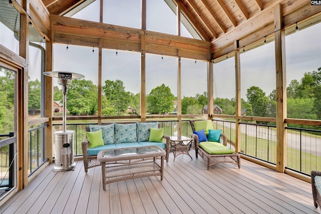 sunroom / solarium featuring an outdoor hangout area