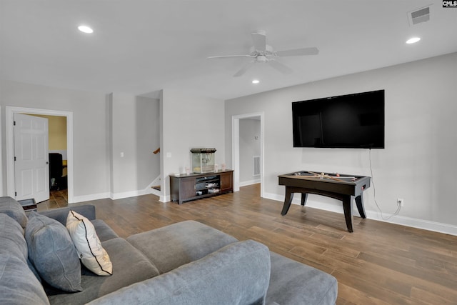 living area featuring recessed lighting, stairway, ceiling fan, baseboards, and wood finished floors