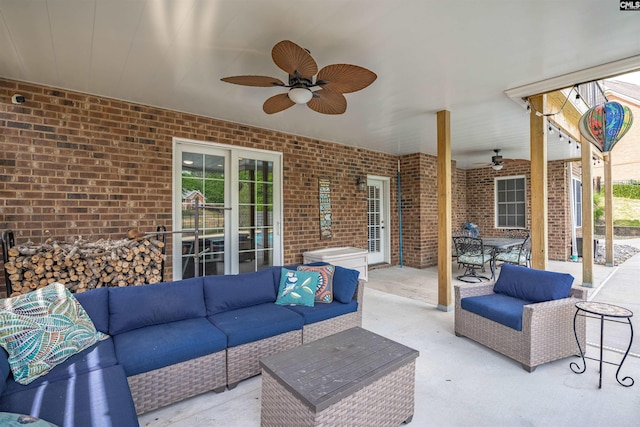 view of patio featuring outdoor lounge area, outdoor dining area, and a ceiling fan