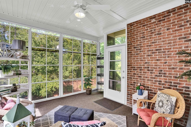 sunroom / solarium with ceiling fan